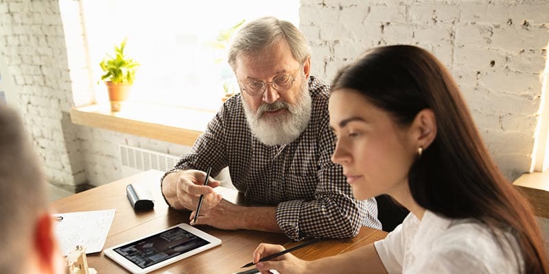 Family members having a discussion about end-of-life arrangements